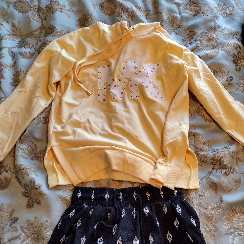 Michael Kors yellow sweatshirt & small patterned Forever 21 pants.
